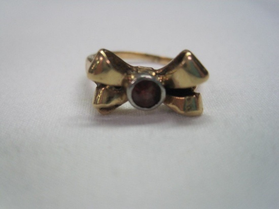 Ladies 14kt. Two-Tone Bow Ring w/ Round Ruby Cracked Bezel Set in Center