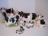 Lot - Black/White Cow Canisters, Tea Pot, Creamer, Sugar, Cookie Jar & Wooden Cow Accent