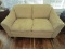 Beige/Cream Upholstered Love Seat w/ Wood Feet