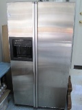Stainless G.E. Profile Performance SidexSide Refrigerator w/ Water/Ice Dispenser