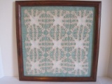 Vintage Hand Crocheted Doily in Wooden Frame & Fabric Background