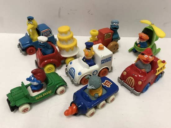 Lot - 8 Die-Cast 1980's Toy Cars, Smurfs, Sesame Street, Etc.