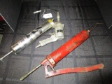 Pair - Grease Guns, 1 Red Metal, 1 Stock No.219