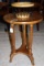 Round Top Wooden 2-Tier Side Table, Tri-Legged Base, Carved Motif