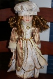 Unique 1-5000 Doll Porcelain Face/Hands/Feet in Colorful Ornate Dress/Hat w/ Stand