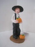 Amish Boy Holding Pumpkin Figurine Base Marked