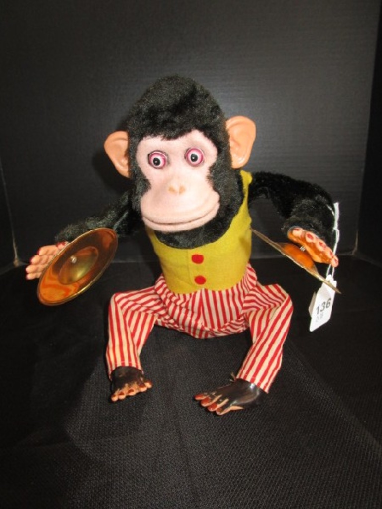 vintage clapping monkey