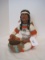 Universal Statuary Corp. © 1976 Native American Indian Woman Making A Basket