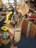 Lot - Tools, Saws, Rakes, Hoes, Pick Axe in Barrel