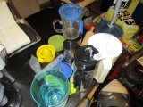 Lot - Plastic Pitchers, Orange Squeezer, Measuring Cups, Rolling Pin, Etc.