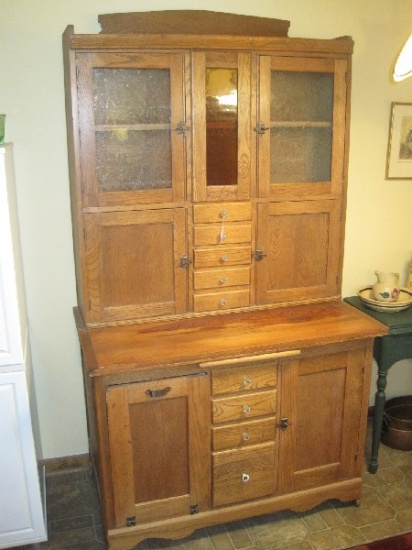 Antiqued Globe Bosse World Furniture Co. Hoosier Cabinet on Wooden Casters