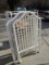 White Metal Crib Carved/Attached Pediment Slat Design on Casters