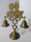 Brass Stand w/ Boy/Girl Sitting & Double Bells on Plinth Base