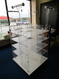 4-Tier Plastic Shelving Square Motif Clothes Display Stand on Casters