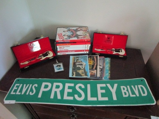 Lot - Elvis Presley Blvd Sign, 2 White Mini Guitars in Cases, Elvis DVD's, Small Bags, Etc.