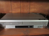 Lot - Sylvania DVD Player w/ Video Cassette Recorders, Remote Model DVC860D