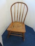 Vintage Arched Back Spindle Rocker w/ Cane Seat