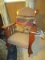 Vintage Wooden Rocking Chair w/ Lion Head Wings, Arched Top, Upholstered Seat, Slat Sides