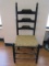 Ladder Back Chair w/ Split Oak Woven Seat Antiqued Flat Black Finish & Finial Accents