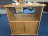 Wooden Side Table 2-Tier Rotating Top on Casters, 2 Hutch Doors, Panel Back