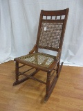 Early Walnut Parlor Rocking Chair w/ Cane Back/Seat