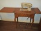 Vintage Singer Sewing Machine in Cabinet on Sabre Legs w/ Accessories