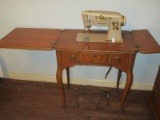 Vintage Singer Sewing Machine in Cabinet on Sabre Legs w/ Accessories