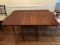 Cherry Wood Drop Leaf Dining Table, Block-Spindle-Block Legs on Casters