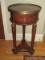 Round Occasional Table Burled Walnut Finish, Reticulated Gallery, Drawer & Reed Columns