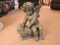 Plastic Cherub Reading Book on Bench Green Décor