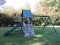 Awesome Residential Kids Wood Playset Rock Wall, Slide, Fort, Swings & More