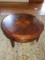 4 Wooden Drawer Round Coffee Table Narrow To Caster Feet, Grooved Columns Panel Motif
