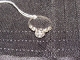 Sterling Silver Ring w/ Large Center Clear Stone Flanked by 4 Stones