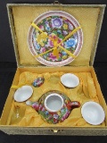 Porcelain Lot - Ornate Floral Pattern Miniature Teapot, Plate, 3 Cups in Box