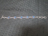 5 Blue Teardrop Topaz Gems in Bead Motif Bracelet