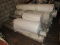Lot - White Rolls Fabric Various Sizes/Lengths on Wood Pallet