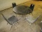 Round Glass Table w/ Curved Metal Legs & 4 Black Upholstered/Metal Frame Chairs