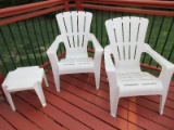 Pair - Stackable Plastic Frame Stationary Adirondack Chairs w/ Side Table