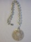 Mother of Pearl Beaded Necklace w/ Intricate Carved Stemmed Flower Reticulated Pendant