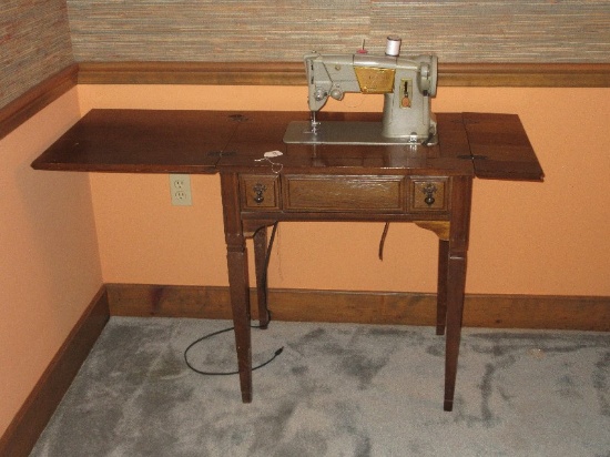 Vintage Green Singer Sewing Machine in Cabinet, Powers on Needle/Feed Move Cabinet