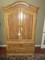 French Country Style Armoire/Media Cabinet Arched Pediment, 2 Panel Doors Over 2 Base