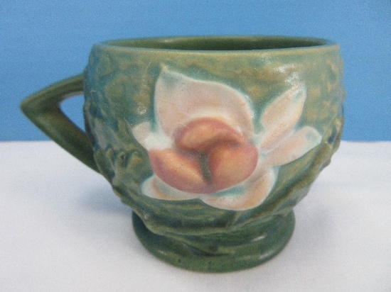 Roseville Pottery Magnolia Pattern 3" Mug Textured Green Background