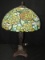 Ornate Cut/Floral Design Metal Lamp w/ Green/Tan Colorful Slag Glass Shade Twin Light