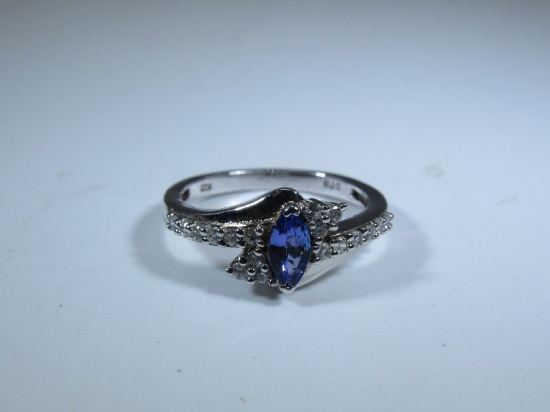 Sterling Silver Ring w/ Sapphire Stone Center Flanked by 18 Small Diamonds