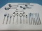 54 Pieces +/- Basic Stainless Flatware Floral & Scroll Motif