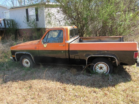 1986 Orange and Black GMC Truck