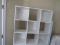 3x3 White wooden cubicle