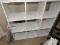 3x3 White wooden cubicle