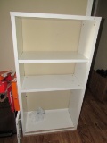 White wooden shelving unit