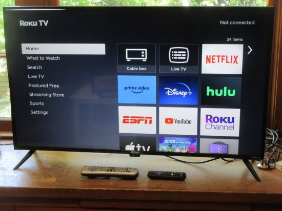 RCA Roku TV 43" UHD TV w/Remote on Stand